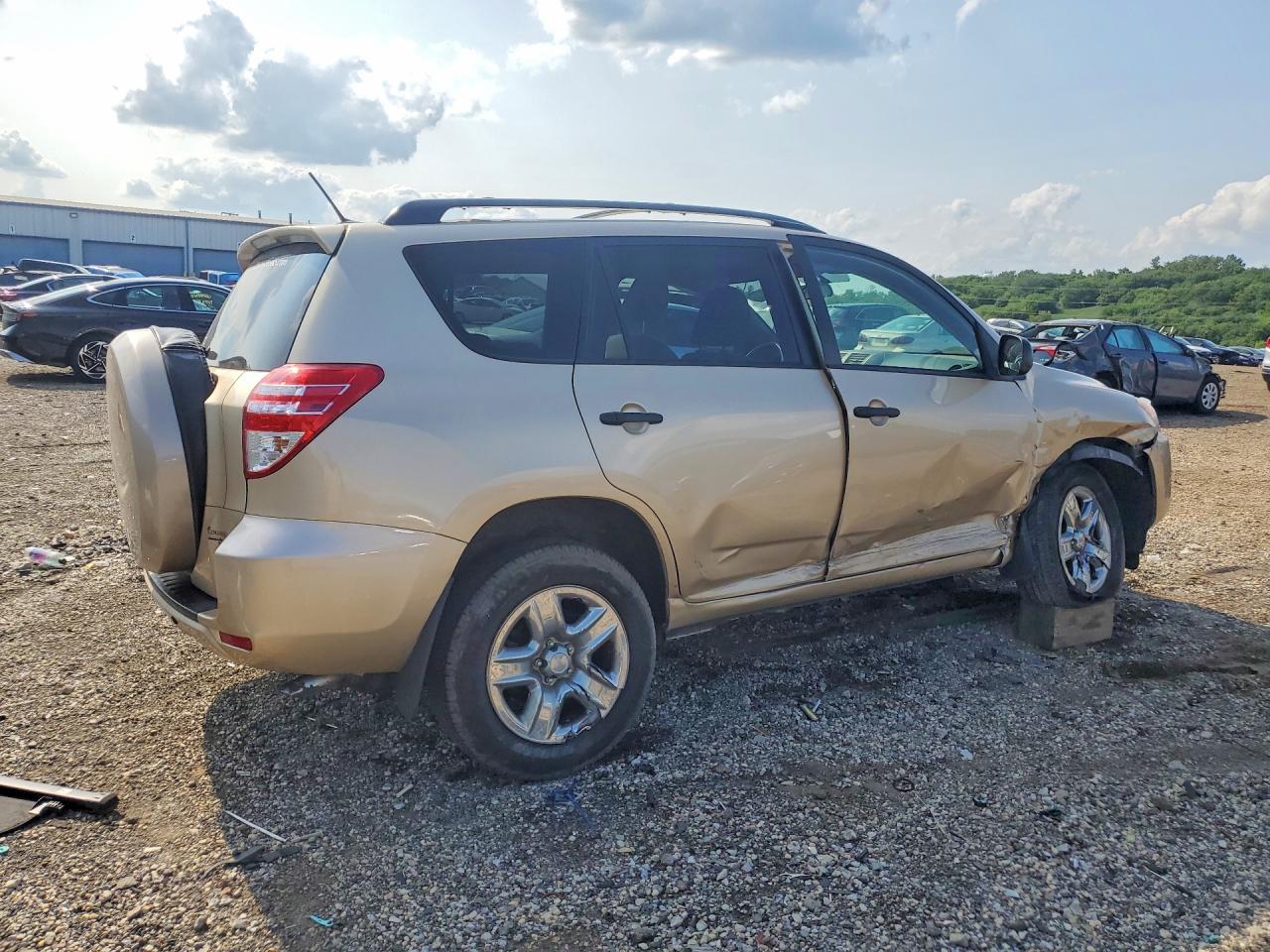 2009 Toyota Rav4 Base Gold vin: 2T3ZF33V59W003452