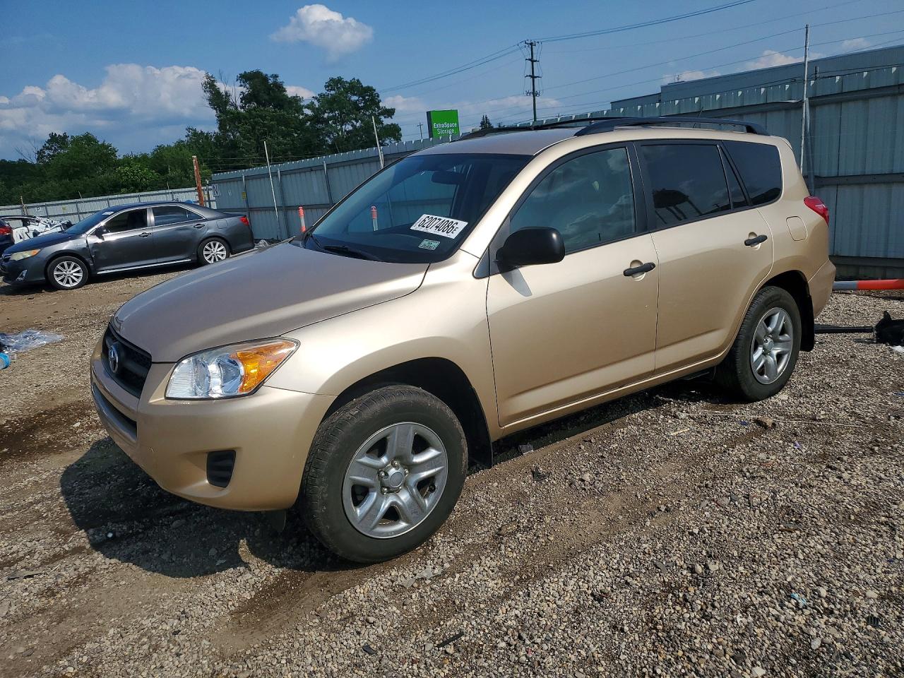 2009 Toyota Rav4 Base Gold vin: 2T3ZF33V59W003452