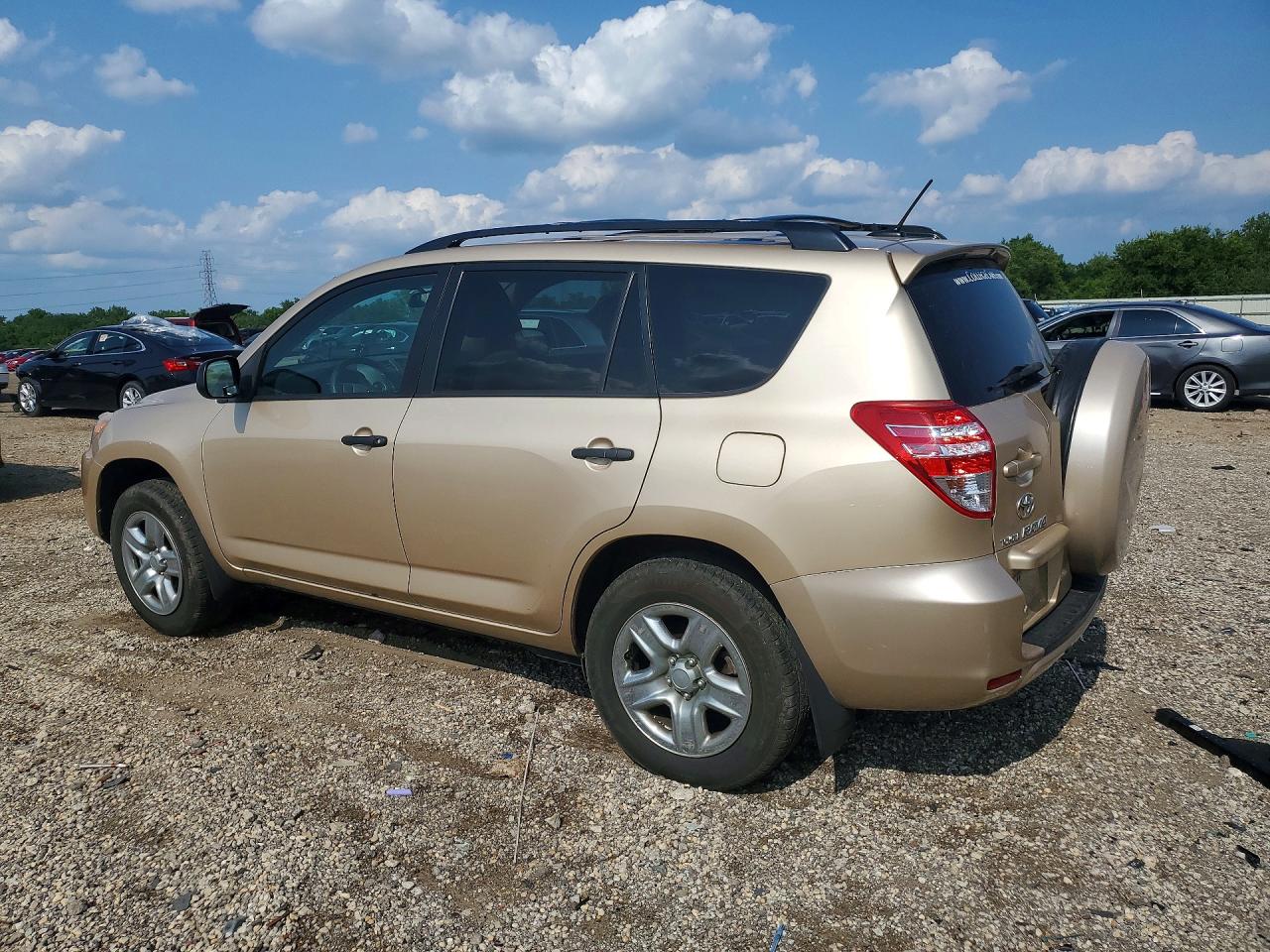 2009 Toyota Rav4 Base Gold vin: 2T3ZF33V59W003452