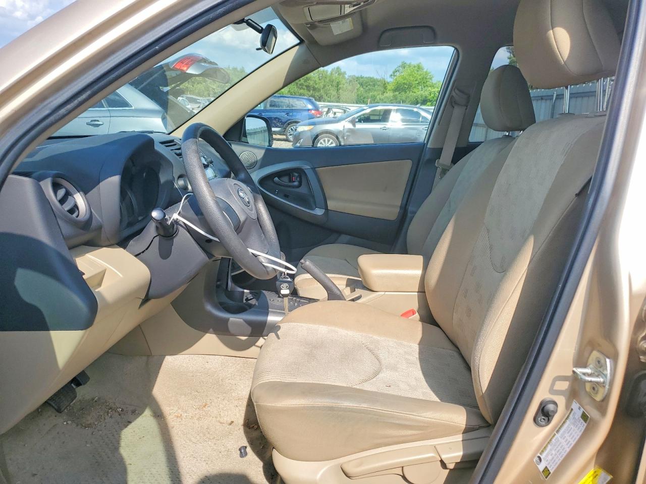 2009 Toyota Rav4 Base Gold vin: 2T3ZF33V59W003452