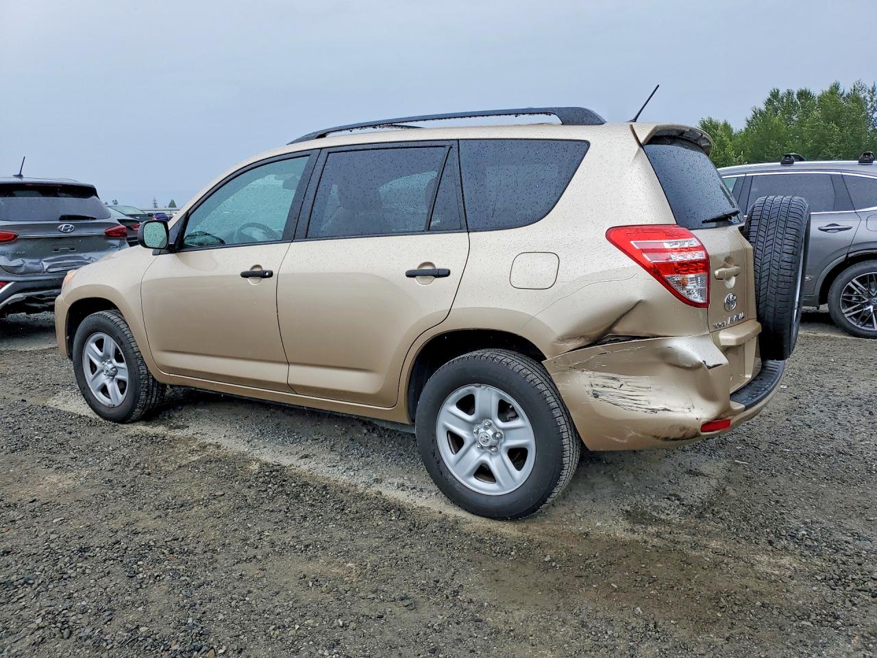 2009 Toyota Rav4 Base Gold vin: 2T3ZF33V89W012467