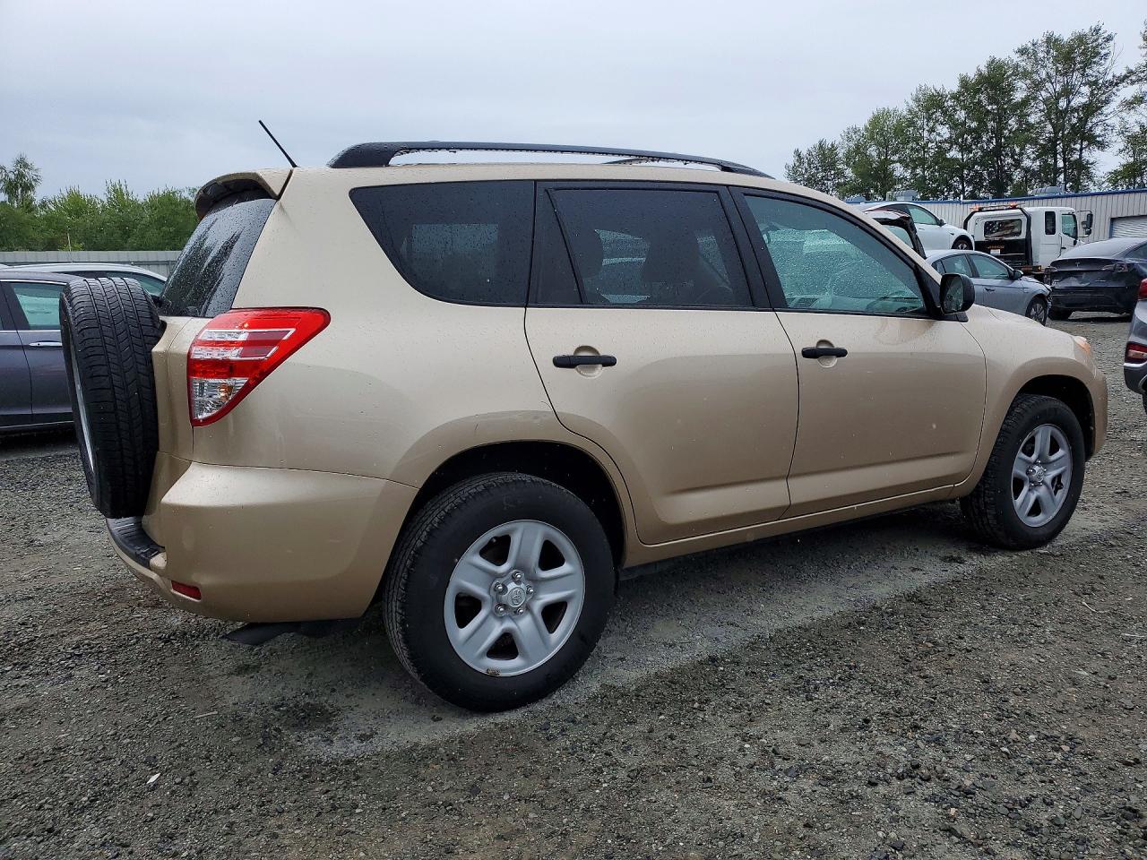 2009 Toyota Rav4 Base Gold vin: 2T3ZF33V89W012467