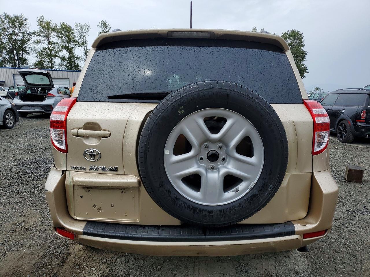 2009 Toyota Rav4 Base Gold vin: 2T3ZF33V89W012467