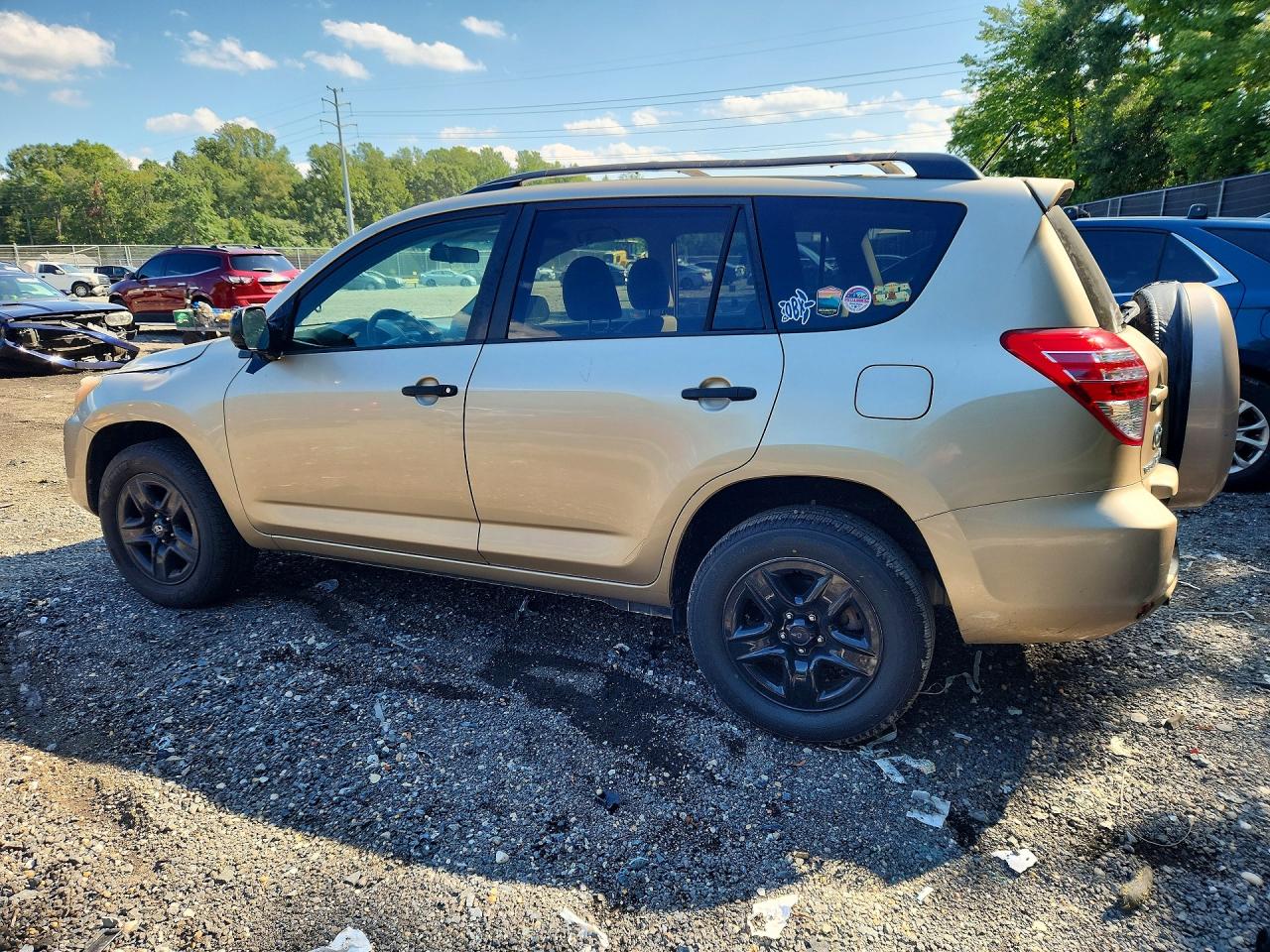 2010 Toyota Rav4 Base Gold vin: 2T3ZF4DV0AW052003