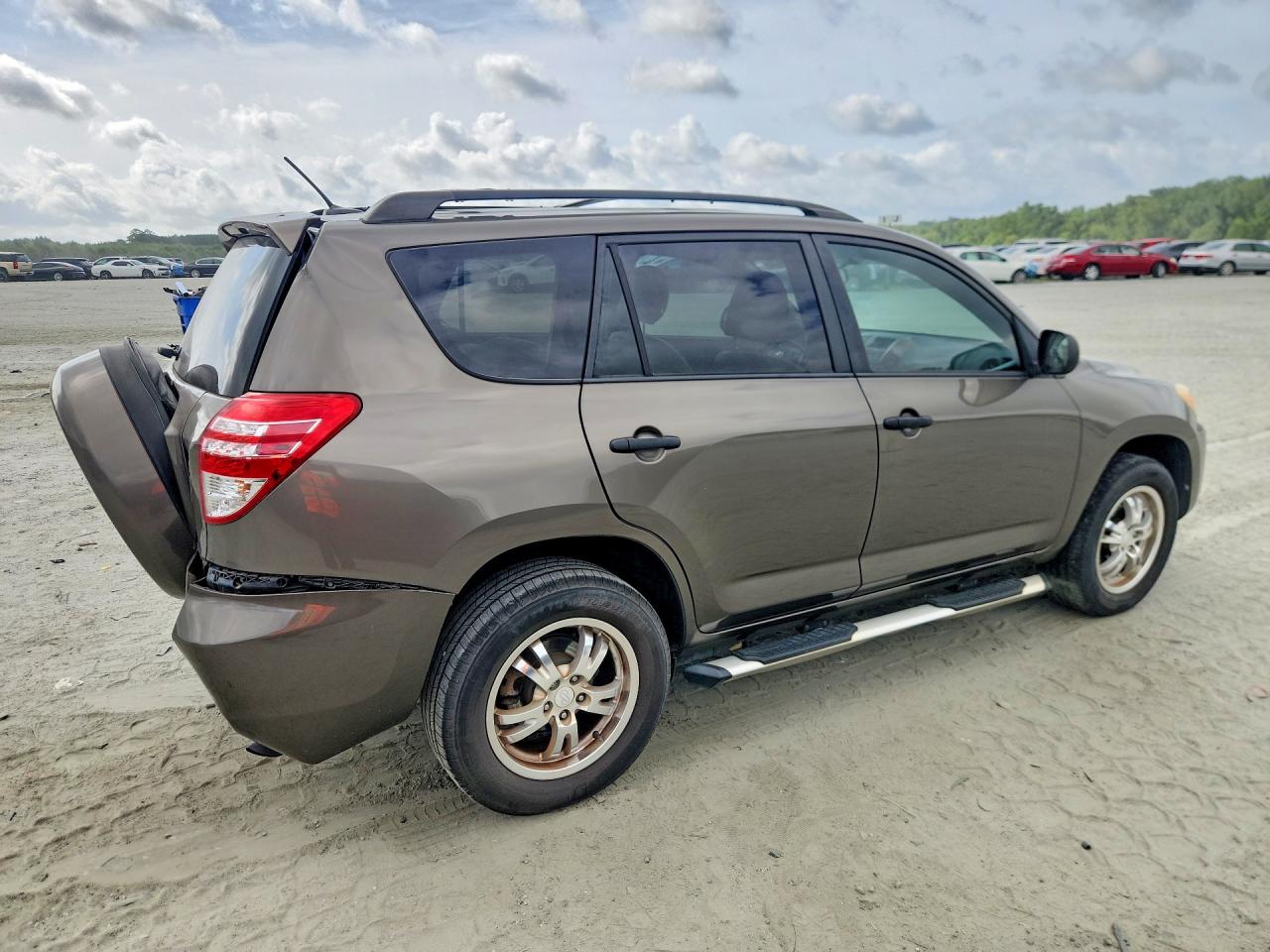 2011 Toyota Rav4 Base Gold vin: 2T3ZF4DV7BW063517
