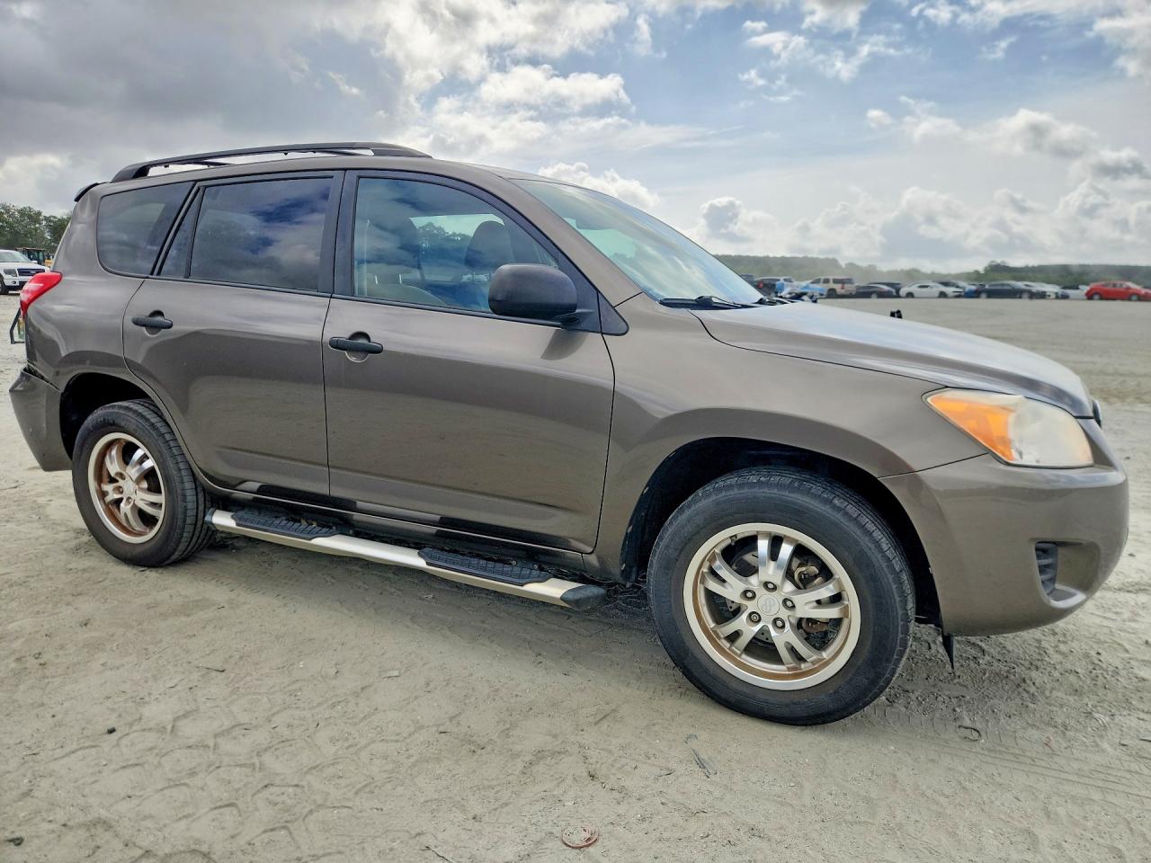 2011 Toyota Rav4 Base Gold vin: 2T3ZF4DV7BW063517