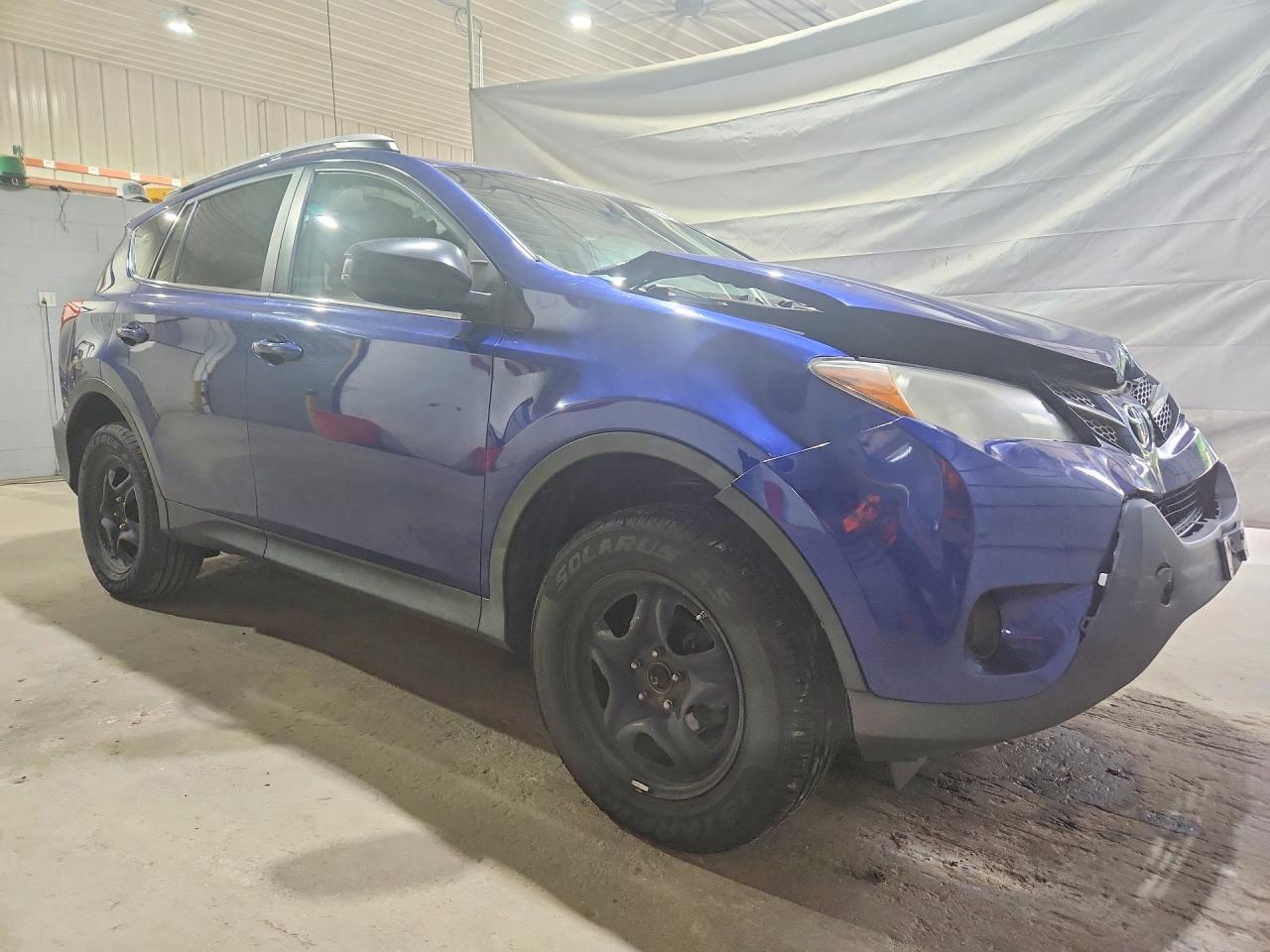 2014 Toyota Rav4 Le Blue vin: 2T3ZFREV7EW092967