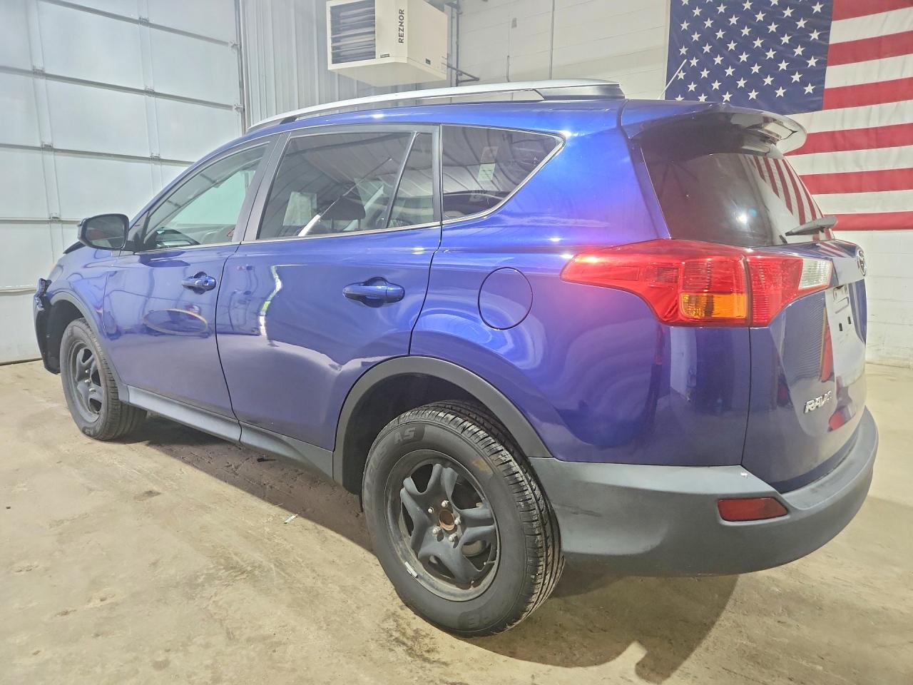 2014 Toyota Rav4 Le Blue vin: 2T3ZFREV7EW092967