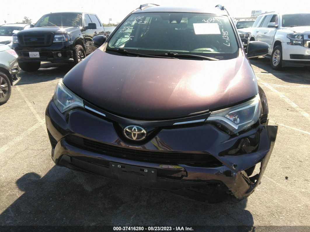 2017 Toyota Rav4 Le Burgundy vin: 2T3ZFREV8HW373034