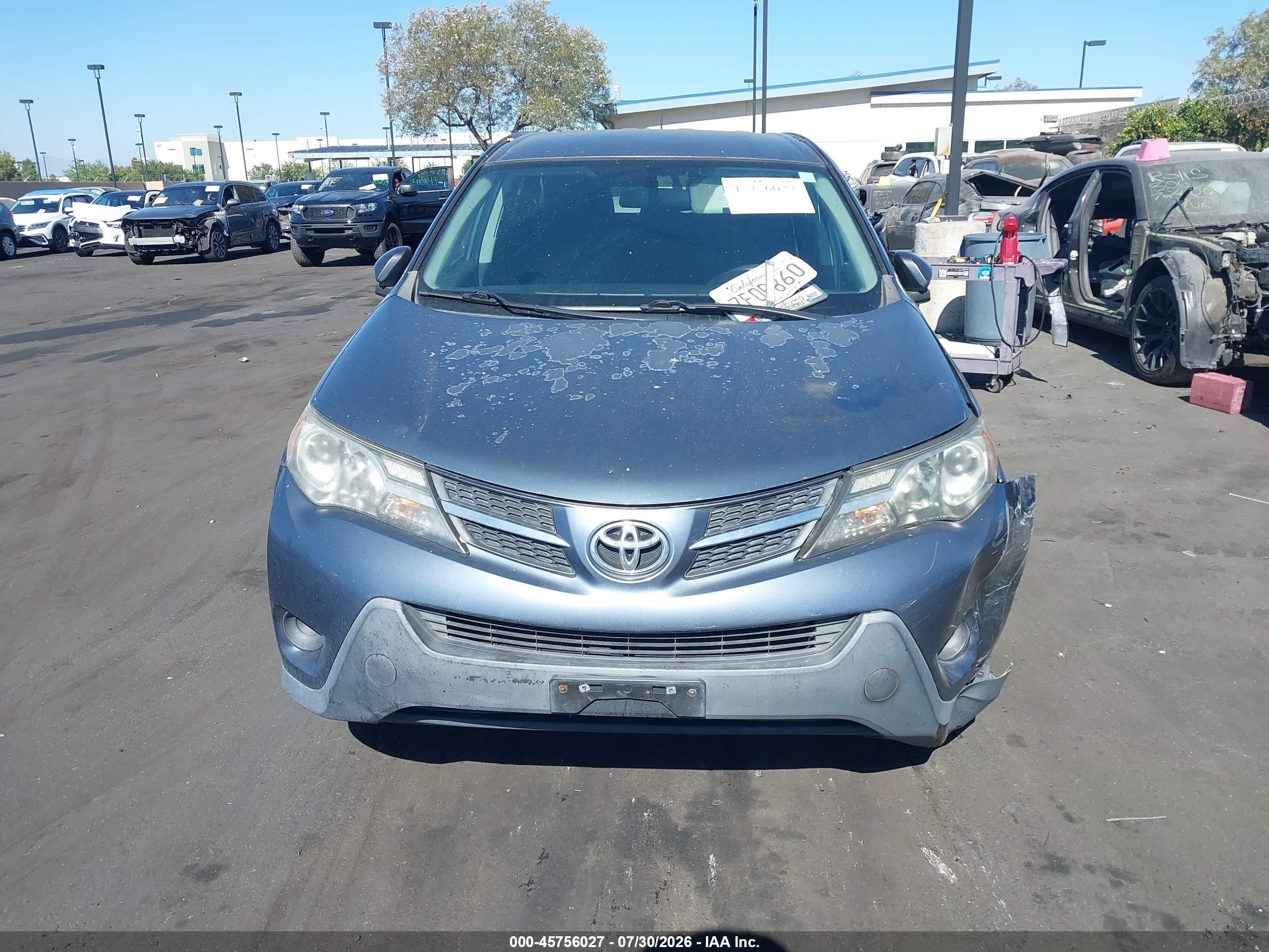 2014 Toyota Rav4 Le Blue vin: 2T3ZFREV9EW087088