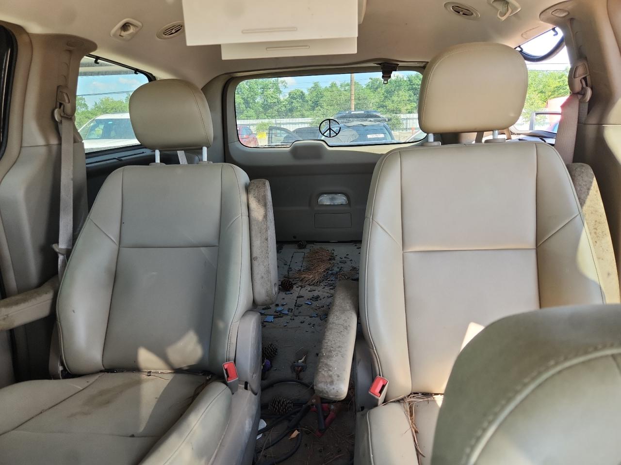 2011 Volkswagen Routan Se Black vin: 2V4RW3DG3BR643486 Damage: Left Rear Armrest, Stained, Permanent