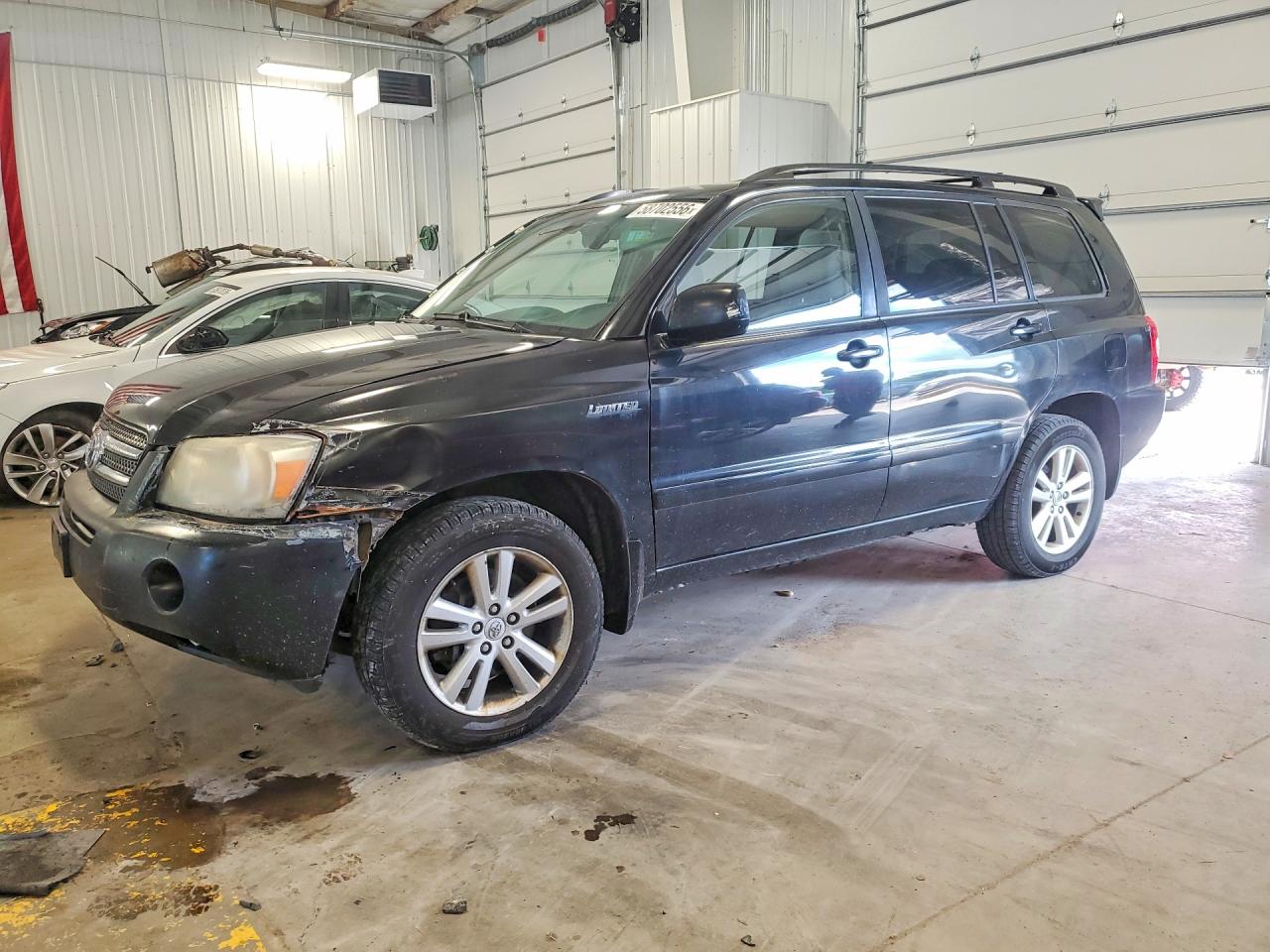 2006 Toyota Highlander Hybrid Black vin: JTEEW21A260015109