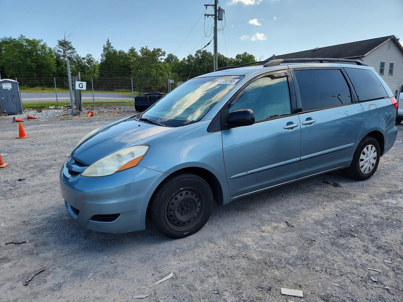2009 Toyota Sienna Le 7-passenger Blue vin: 5TDZK23C69S245883