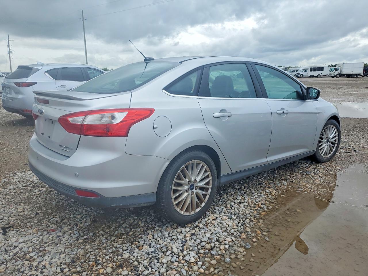 2013 Ford Focus Titanium Серебряный vin: 1FADP3J20DL345814