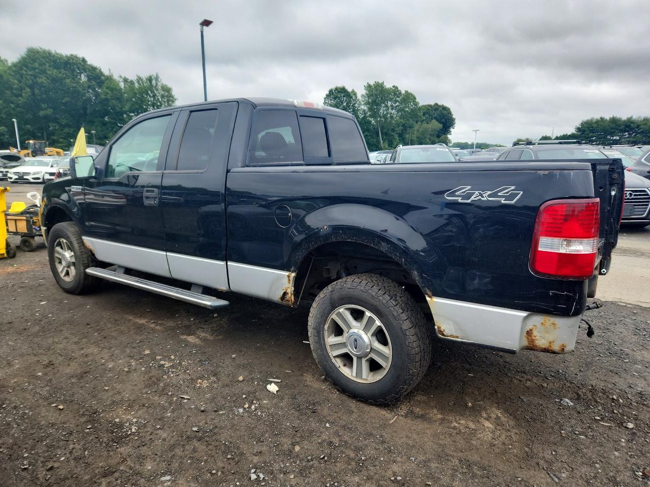 2007 Ford F150 Black vin: 1FTPX14587FB66912