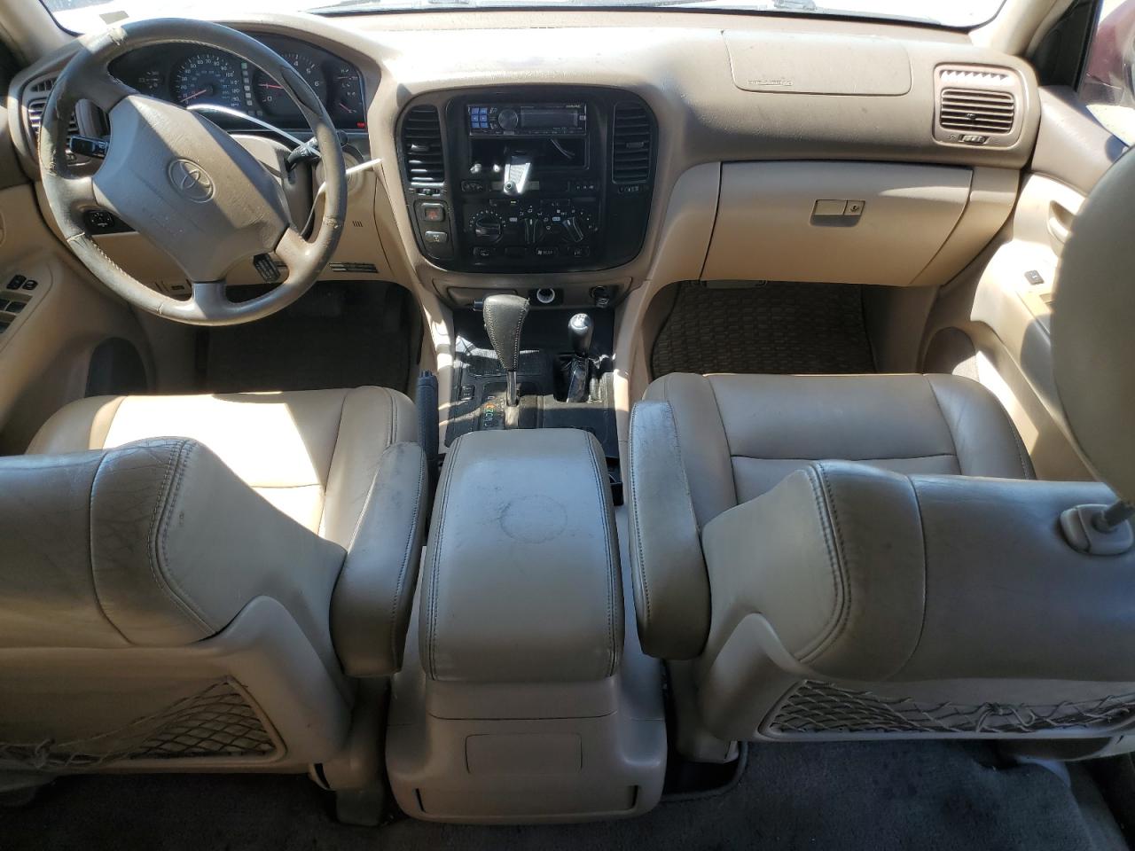 1999 Toyota Land Cruiser    Burgundy vin: JT3HT05JXX0048695