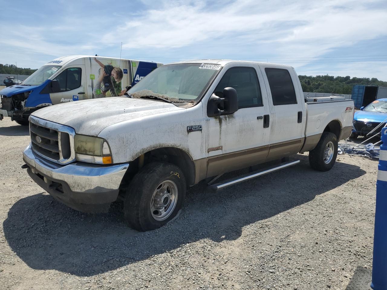 2004 Ford F250 Super Duty White vin: 1FTNW21P84EC11306 Damage: Left Front Tire, Flat, Repair Required
