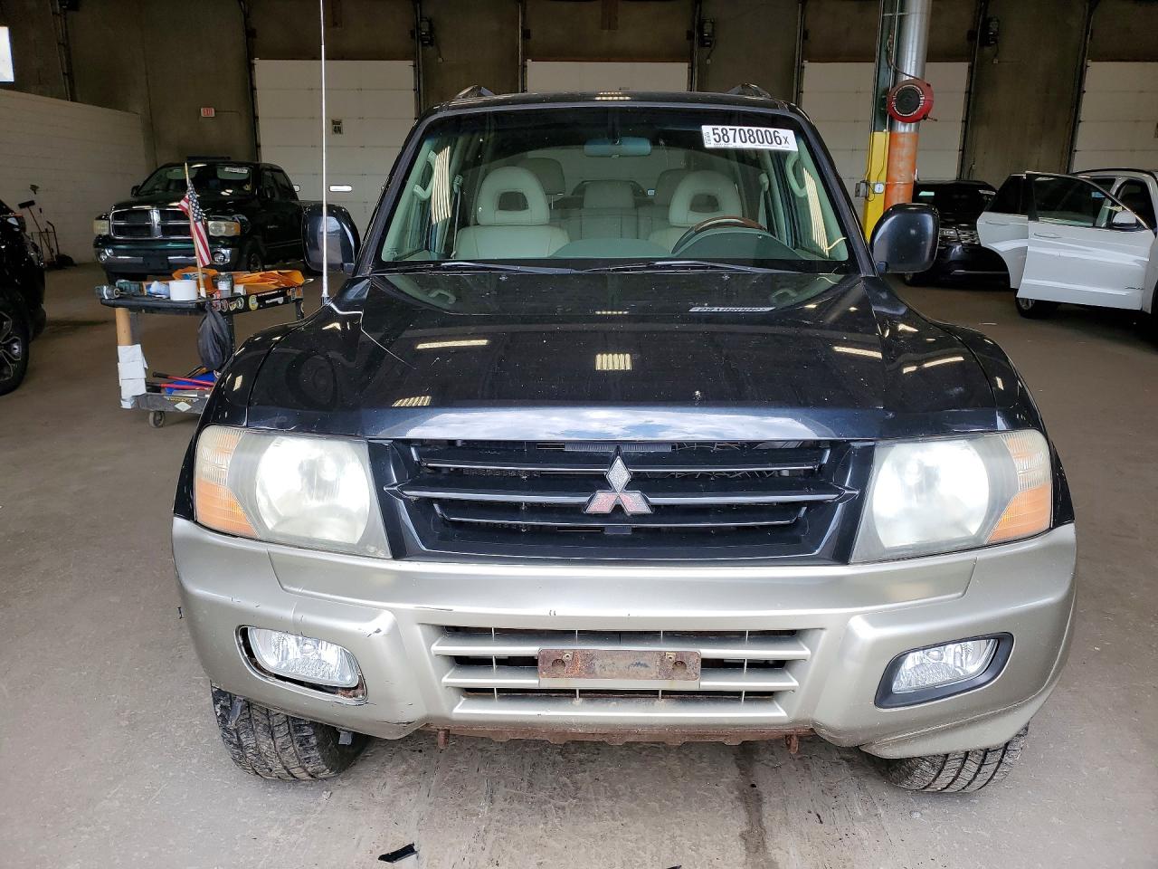 2002 Mitsubishi Montero Limited Black vin: JA4MW51RX2J003019
