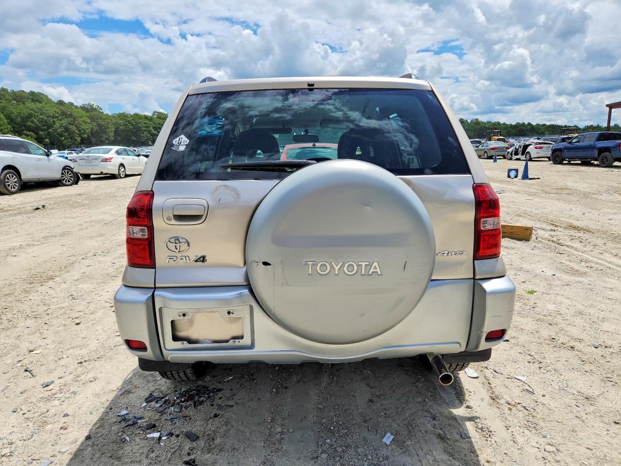 2004 Toyota Rav4 Base Gold vin: JTEHD20VX40020224