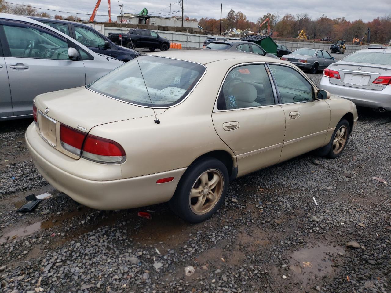 1996 Mazda 626 Es Gold vin: 1YVGE22D0T5580265
