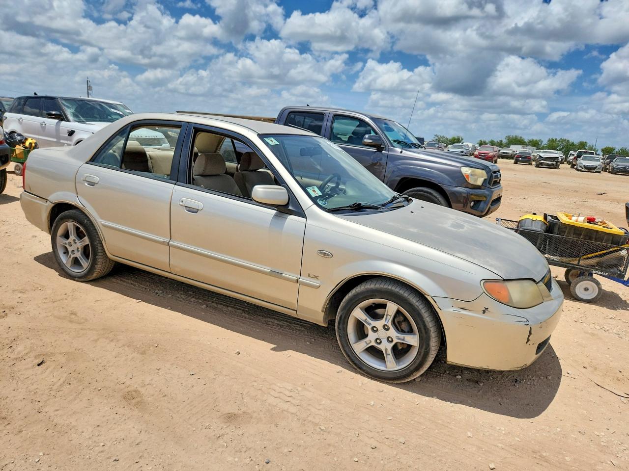 2003 Mazda Protege Dx Бежевый vin: JM1BJ225731198746