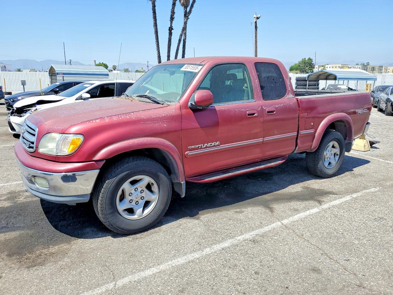 2002 Toyota Tundra Access Cab Limited Red vin: 5TBBT48162S289561