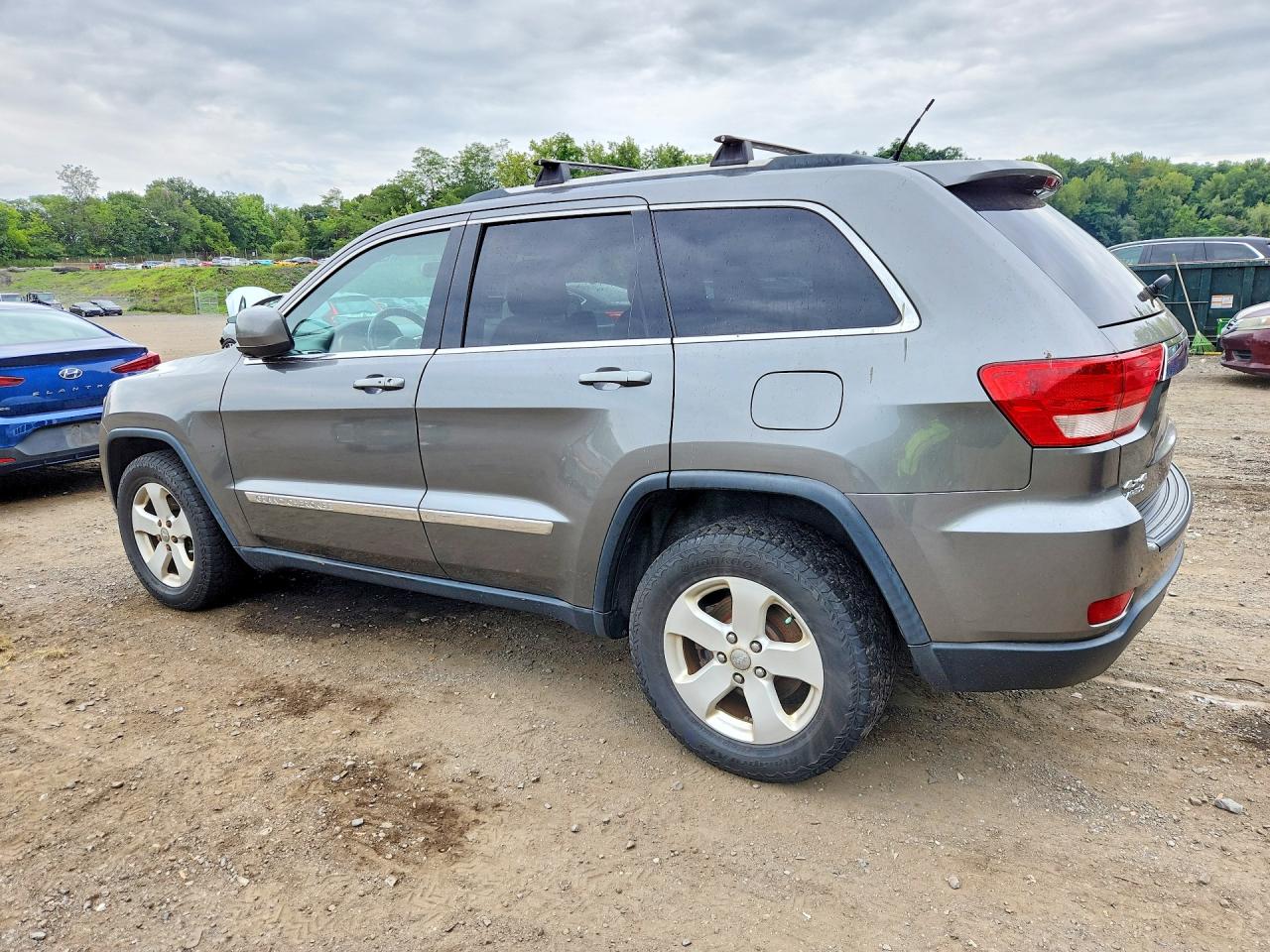 2013 Jeep Grand Cherokee Laredo Серый vin: 1C4RJFAG0DC542612