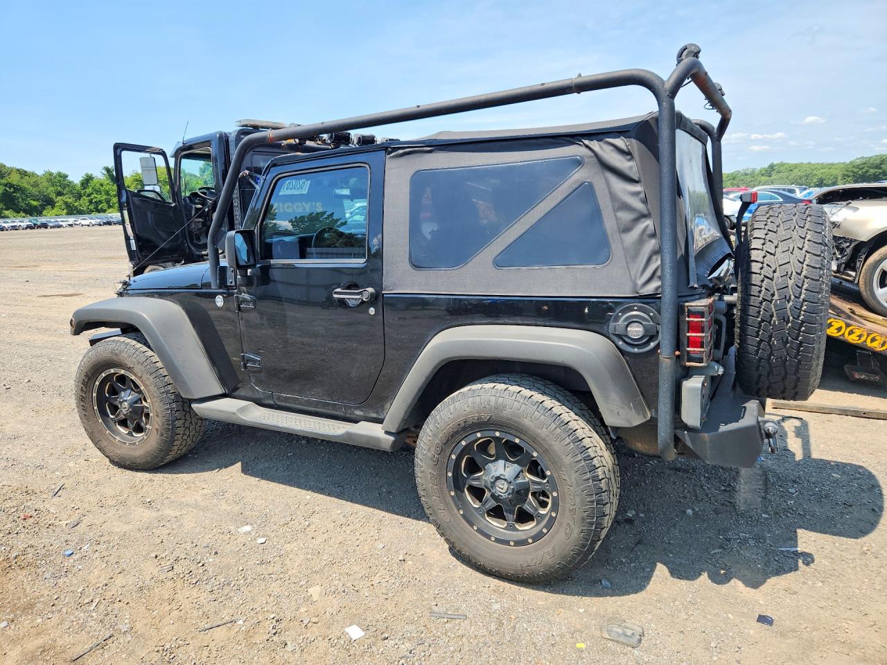 2012 Jeep Wrangler Sport Black vin: 1C4GJWAG2CL105328