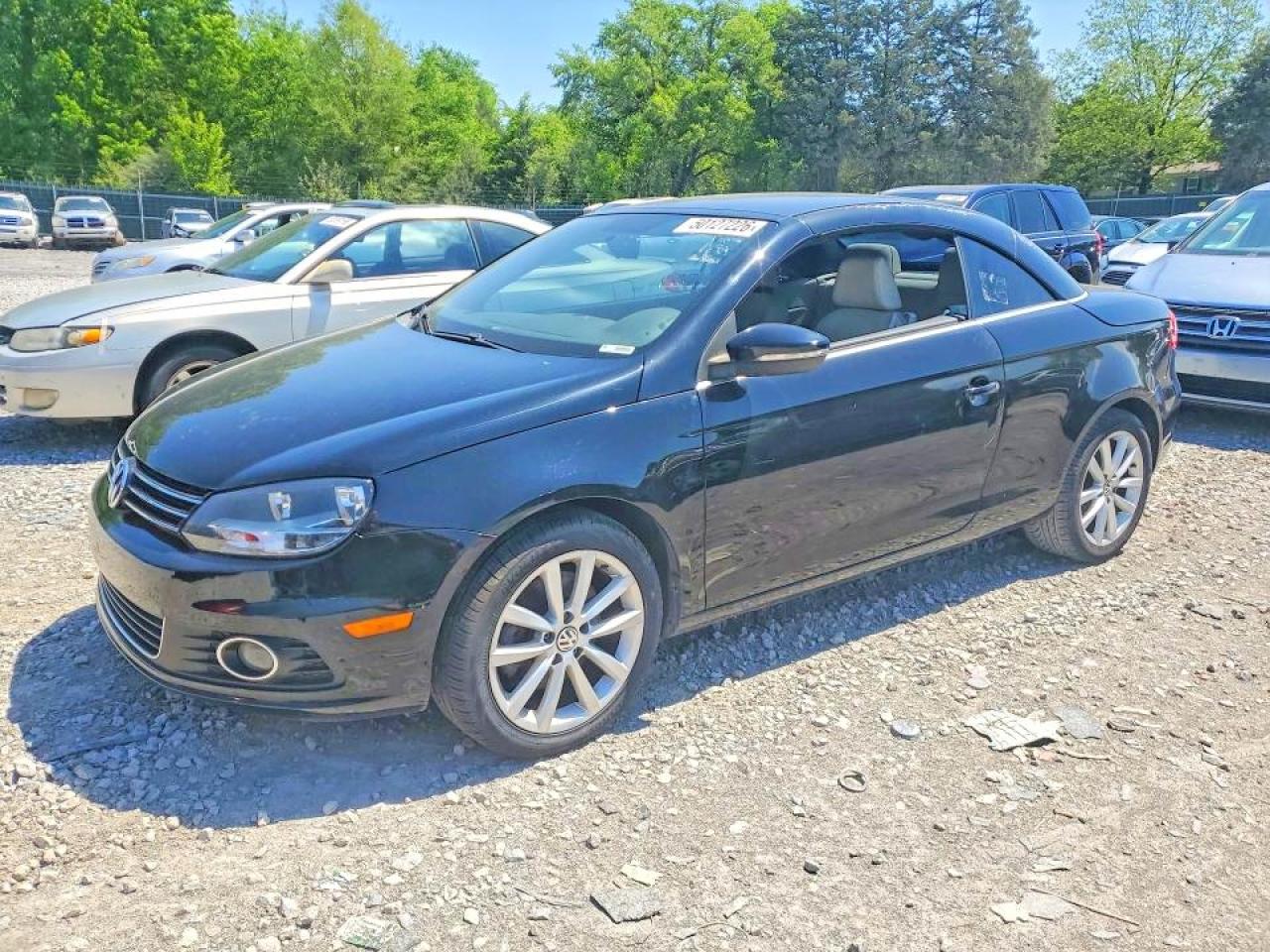 2012 Volkswagen Eos Komfort Black vin: WVWBW7AH8CV005362