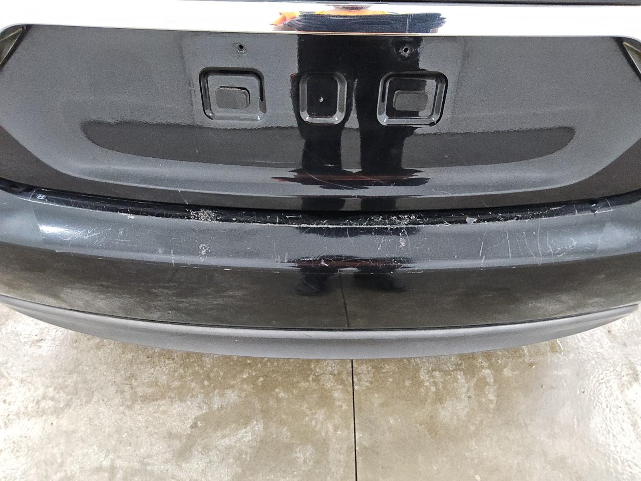 2015 Hyundai Sonata Hybrid Base Black vin: KMHEC4A48FA134792 Damage: Rear Bumper, Heavy Scratch, > 12 Inches