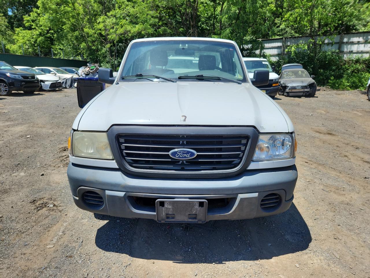 2010 Ford Ranger White vin: 1FTKR1AD8APA09799 Damage: Right Head Lamp, Faded, Repair Required
