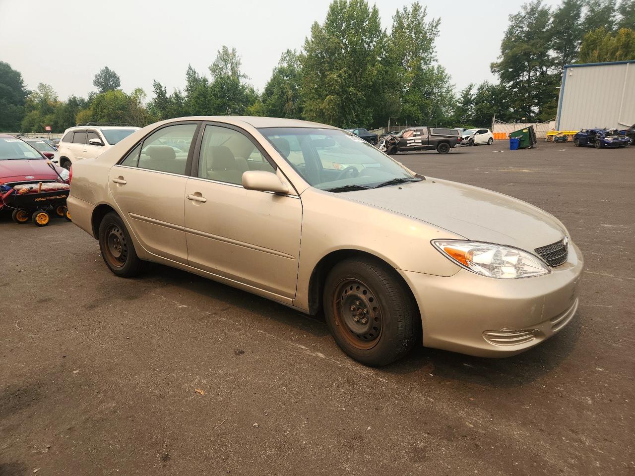 2004 Toyota Camry Le Gold vin: 4T1BE32K74U359169