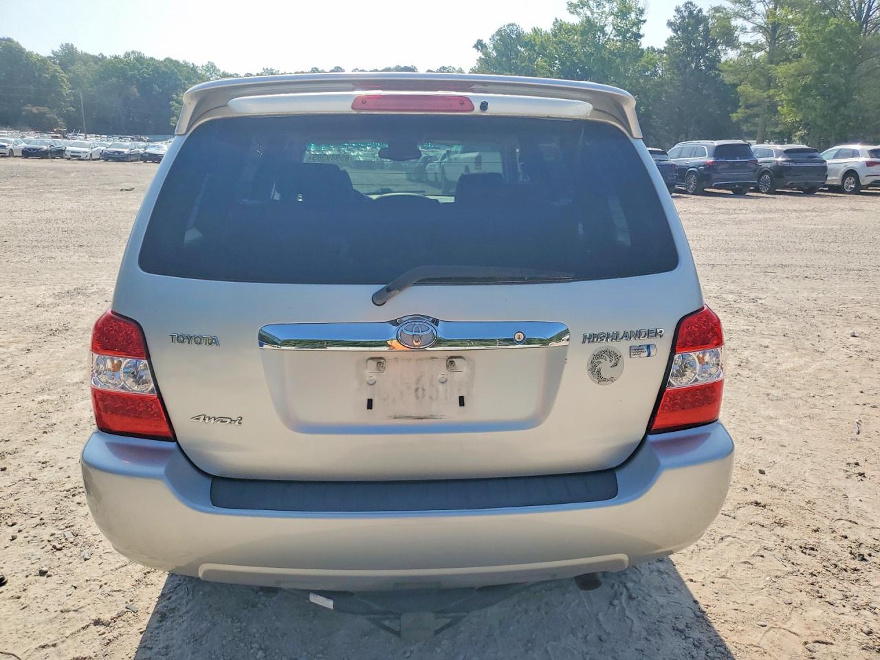 2006 Toyota Highlander Hybrid Gold vin: JTEEW21A860021738