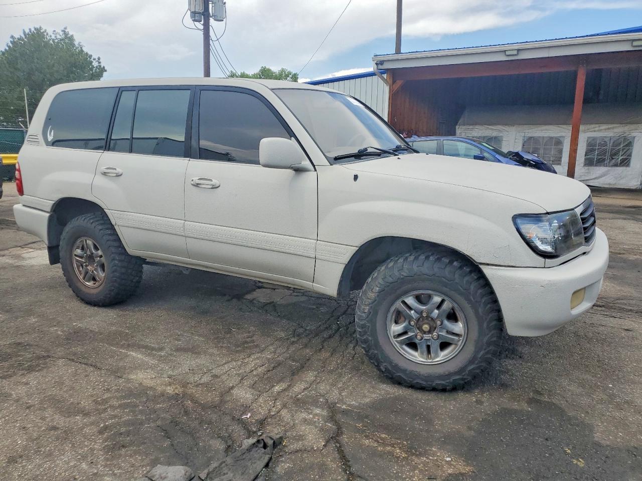 2000 Toyota Land Cruiser Base Beige vin: JT3HT05J2Y0096774