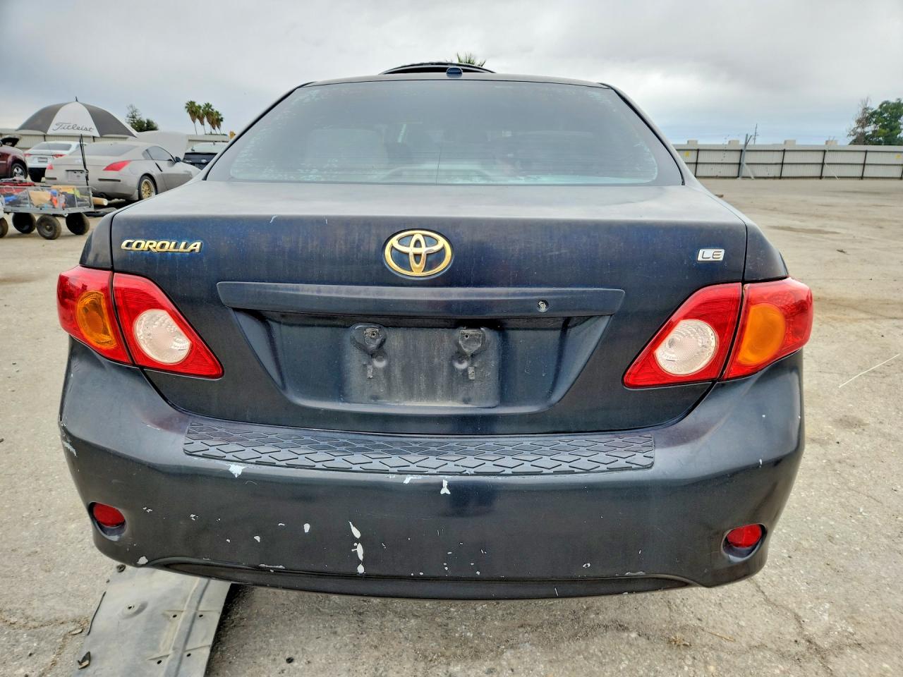 2010 Toyota Corolla Le Black vin: 1NXBU4EE9AZ271623