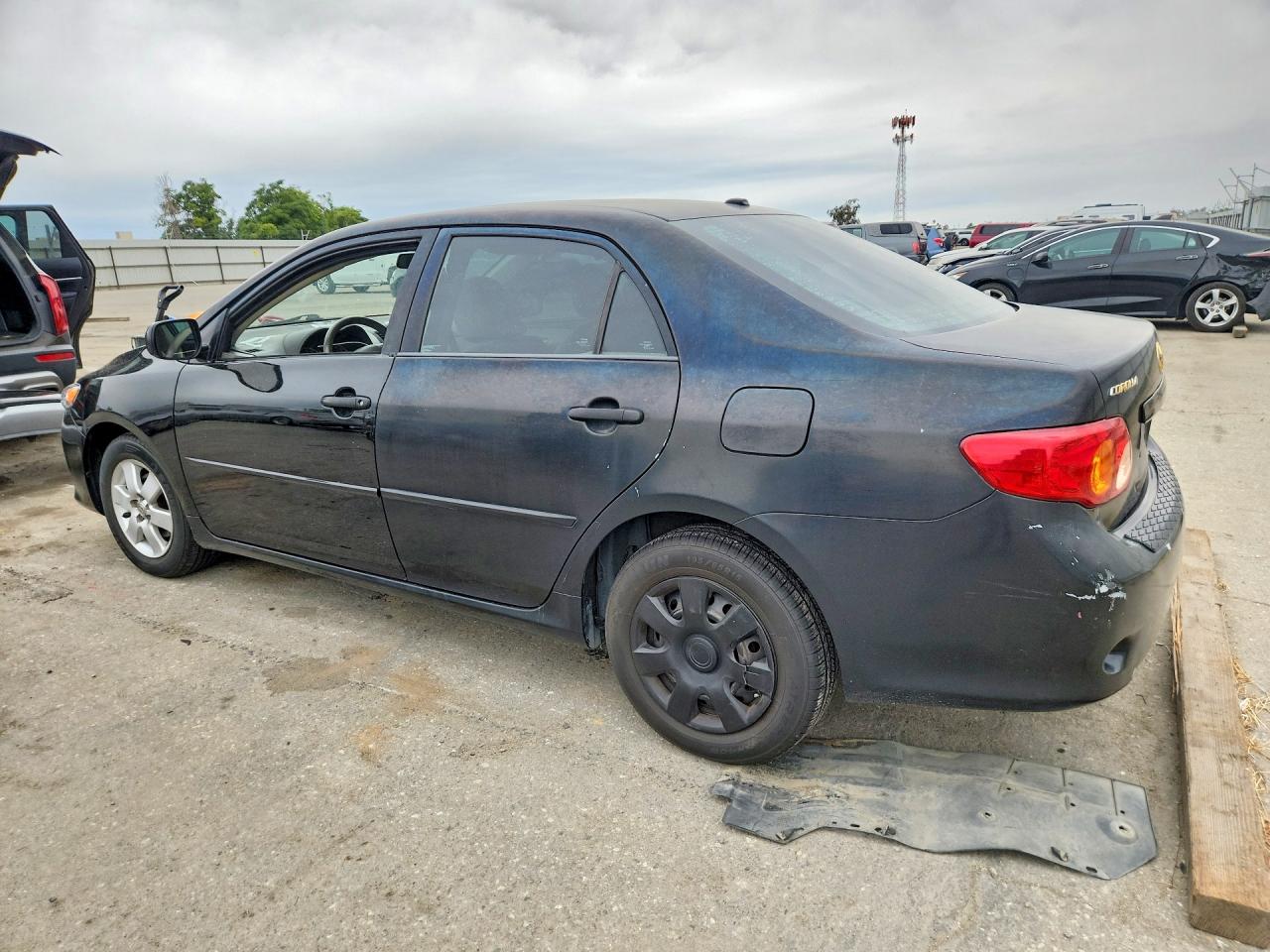 2010 Toyota Corolla Le Black vin: 1NXBU4EE9AZ271623