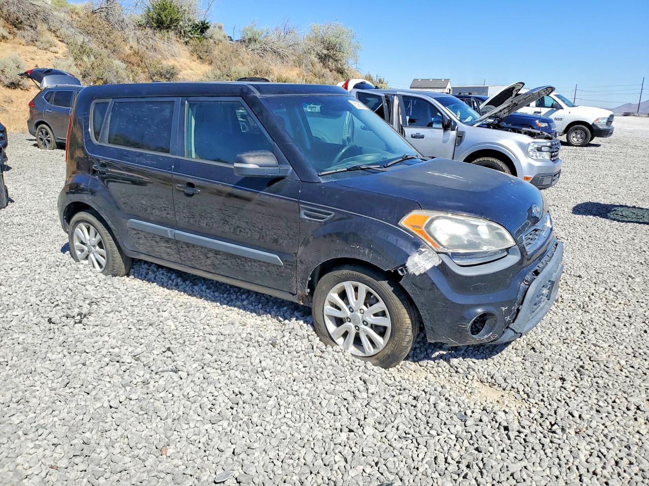 2012 Kia Soul + Black vin: KNDJT2A61C7380844