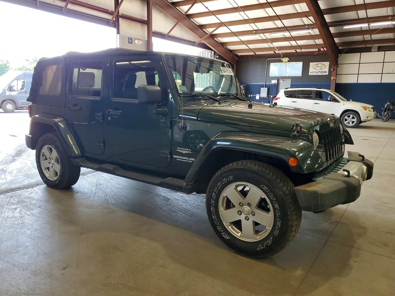 2010 Jeep Wrangler Unlimited Sahara Green vin: 1J4BA5H17AL167899