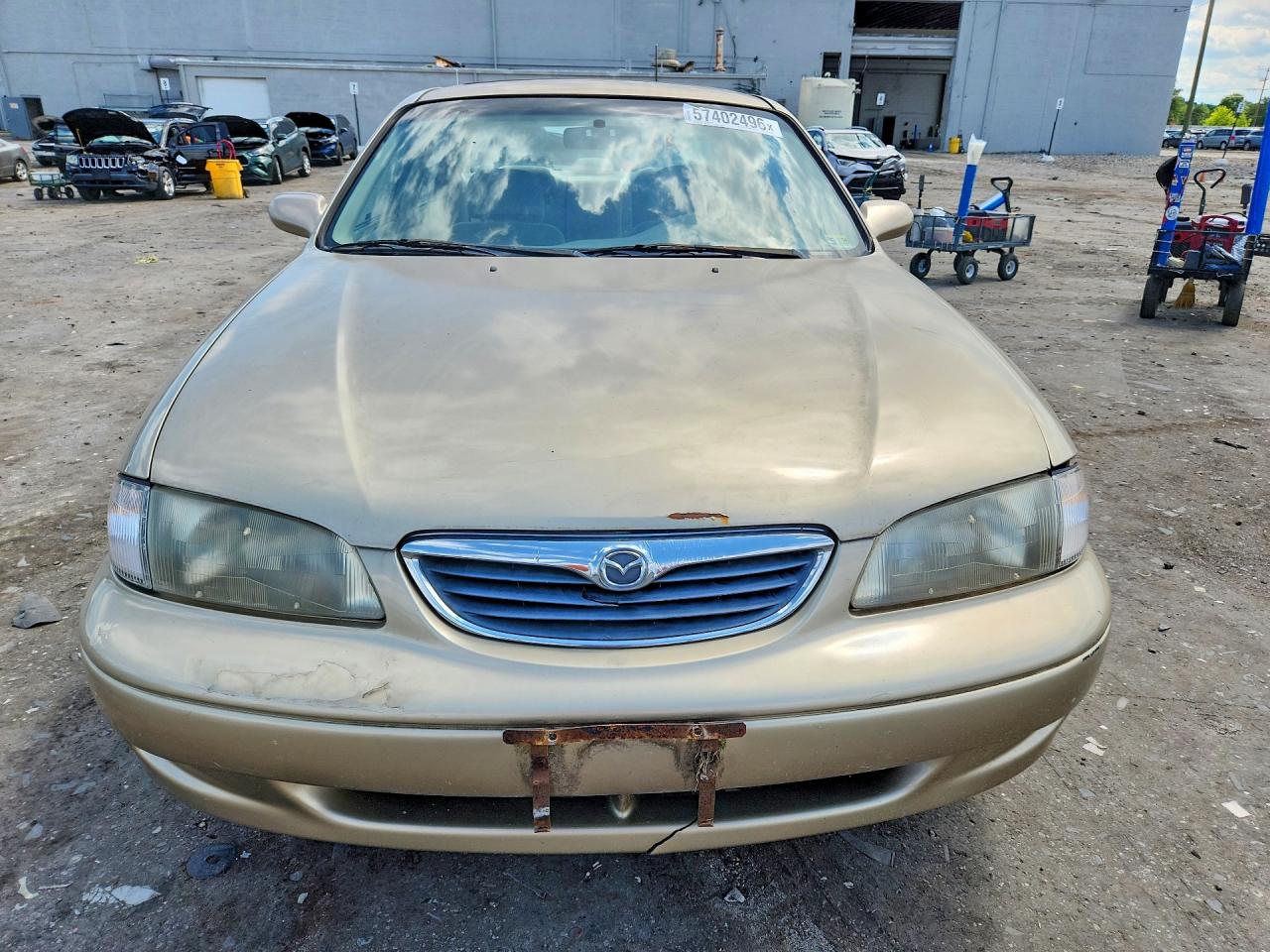 1999 Mazda 626 Es Tan vin: 1YVGF22D7X5871641