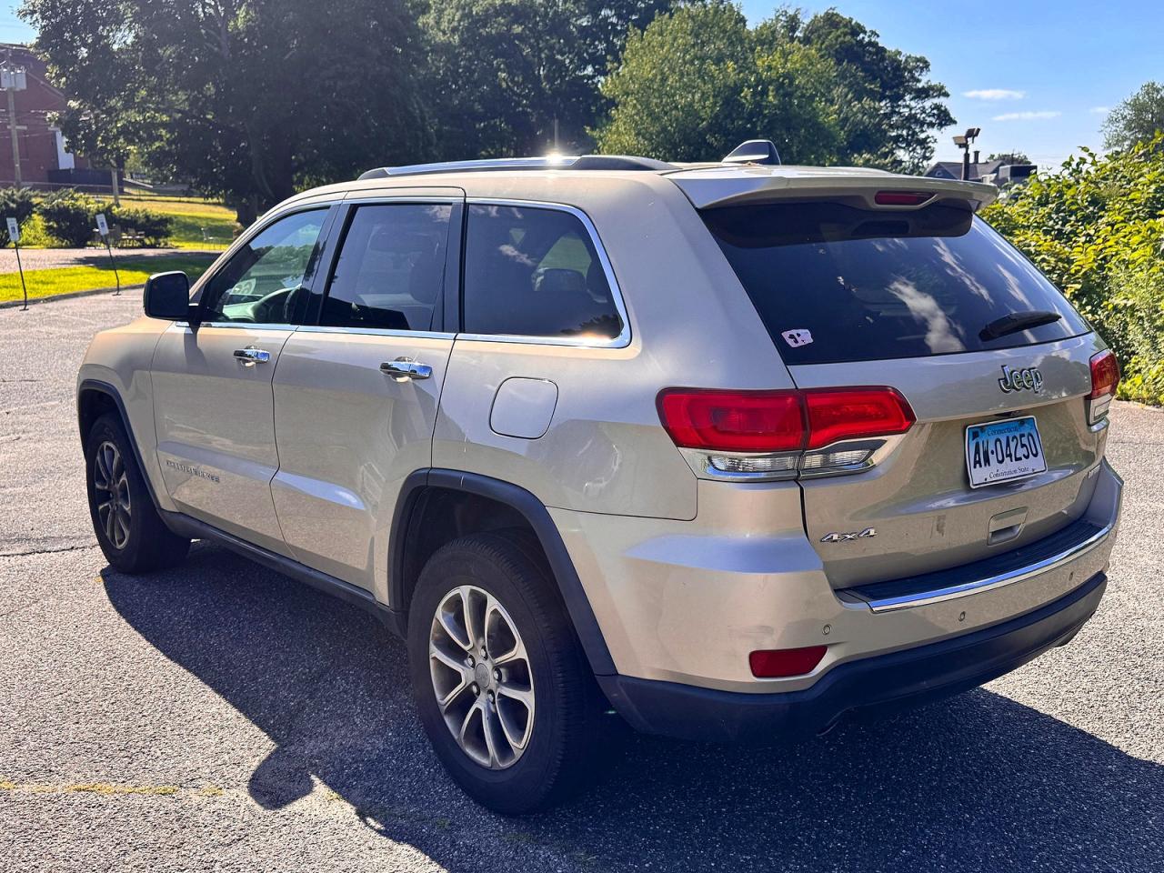 2014 Jeep Grand Cherokee Limited Gold vin: 1C4RJFBG4EC558294