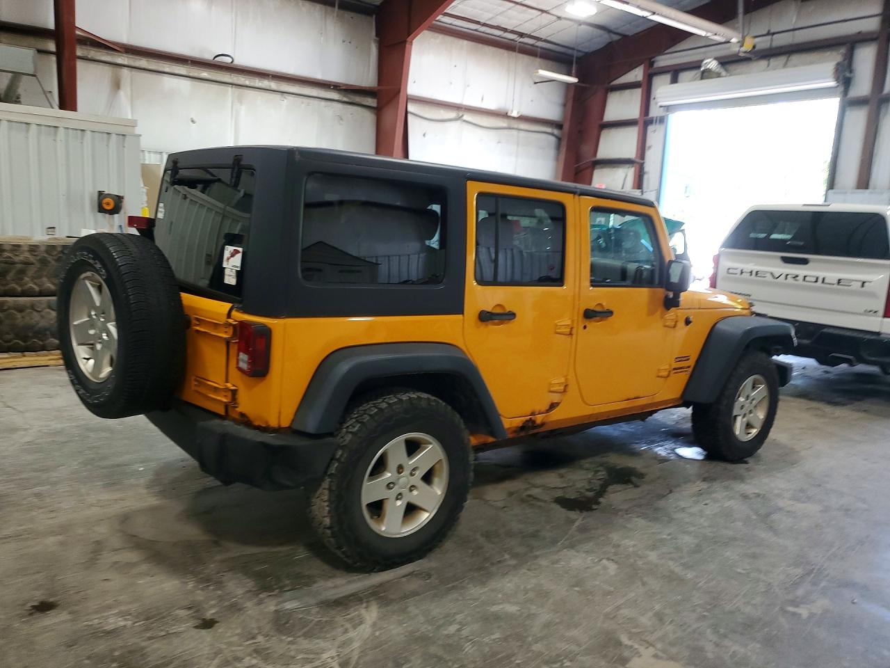 2013 Jeep Wrangler Unlimited Sport Yellow vin: 1C4BJWDG3DL557117