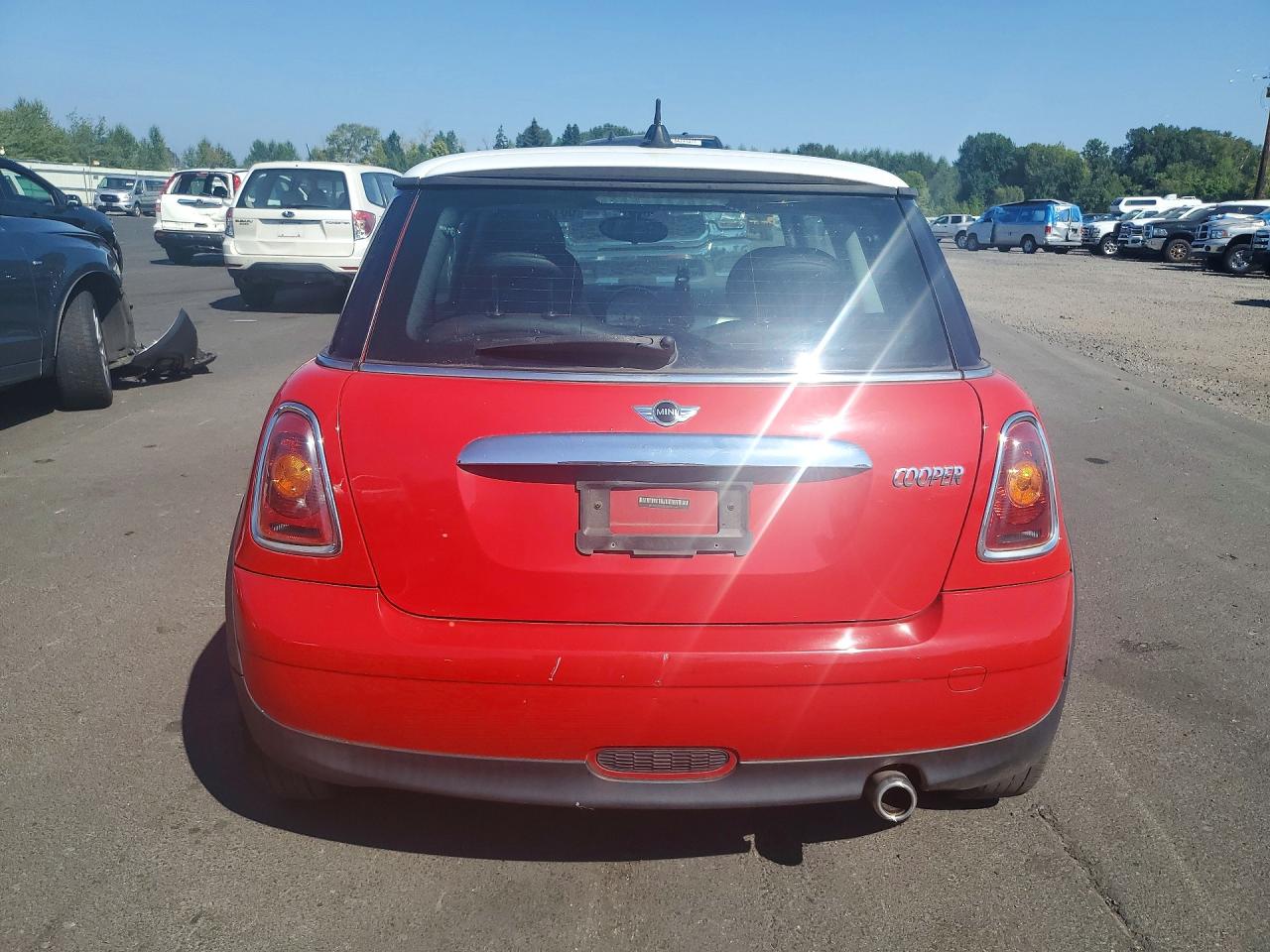 2010 Mini Cooper Red vin: WMWMF3C59ATZ61699