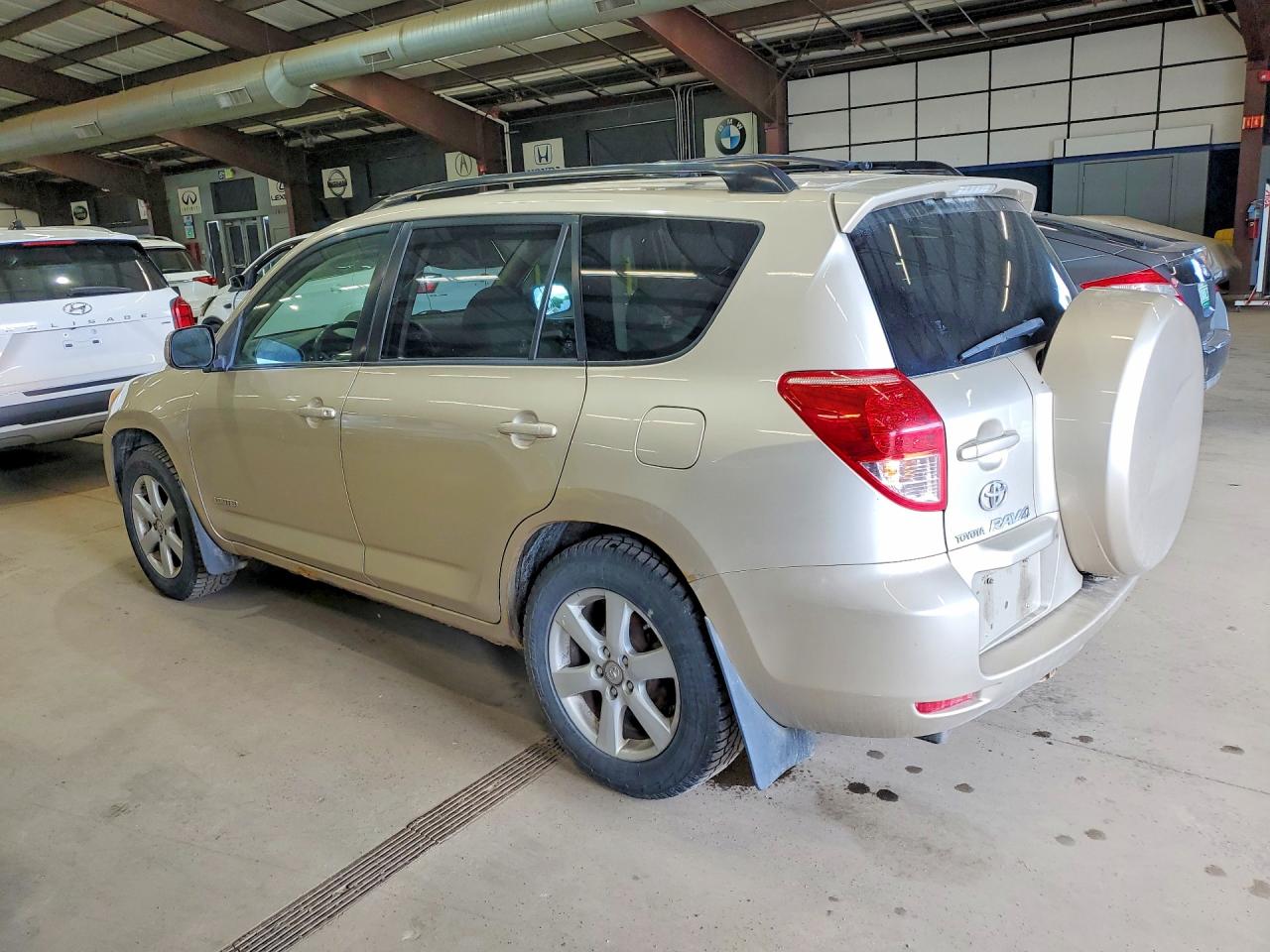 2006 Toyota Rav4 Limited Tan vin: JTMBK31V765007389