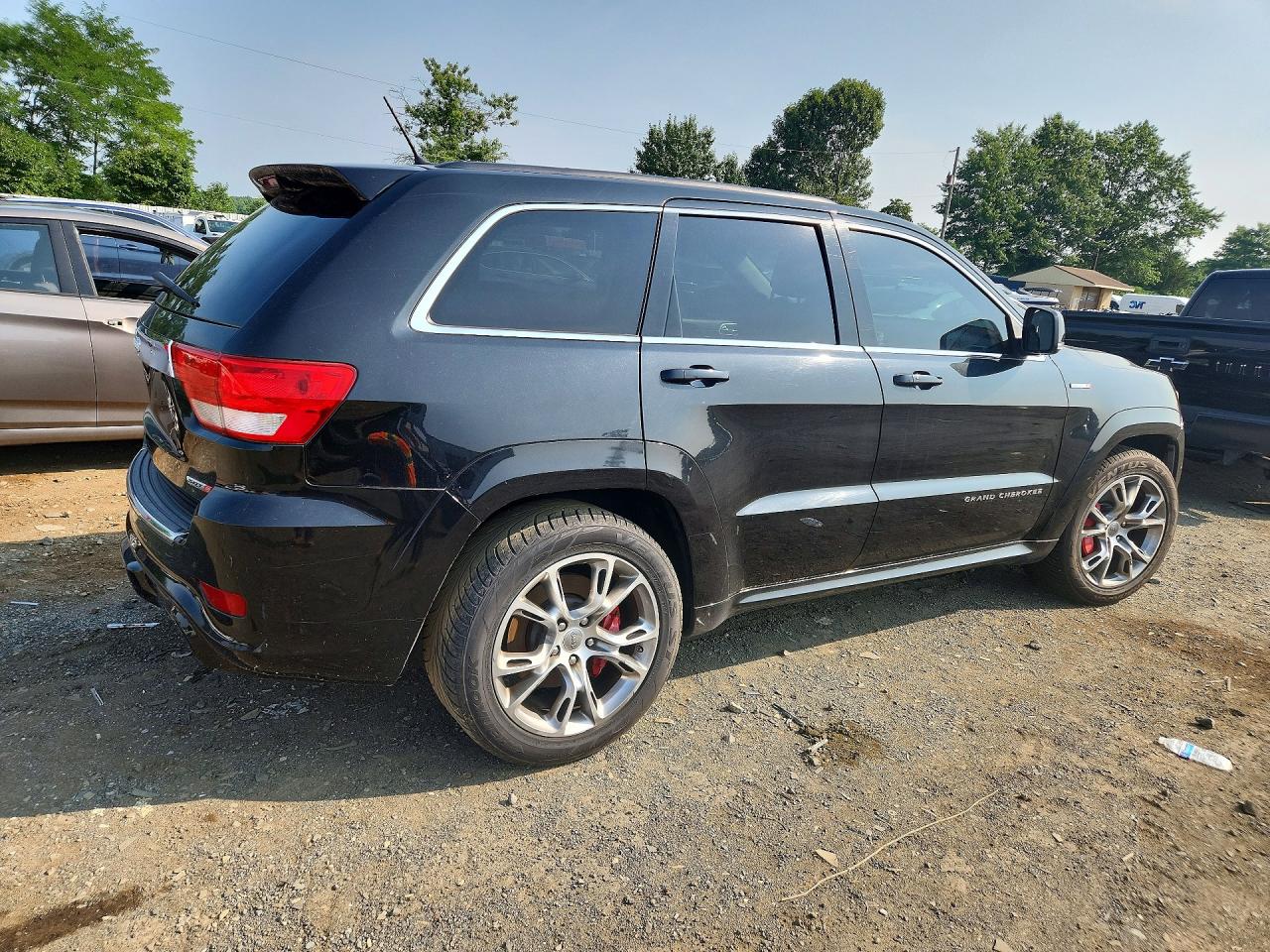 2012 Jeep Grand Cherokee Srt-8 Черный vin: 1C4RJFDJ4CC285136