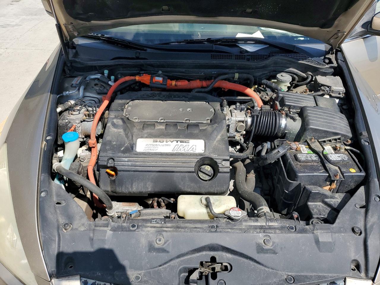 2005 Honda Accord Hybrid Gold vin: JHMCN36445C014837