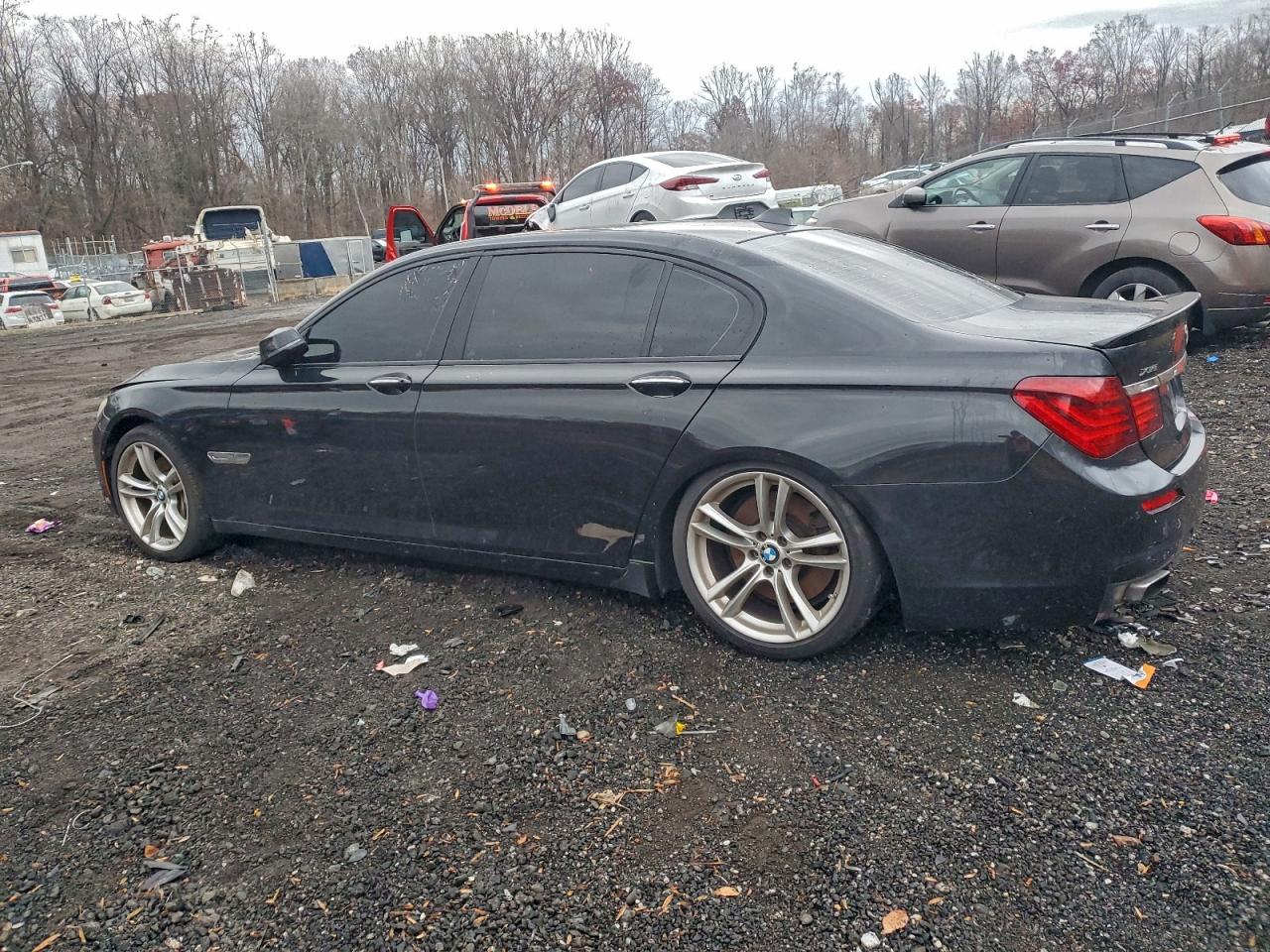 2014 Bmw 750 Lxi Черный vin: WBAYF8C53ED652924