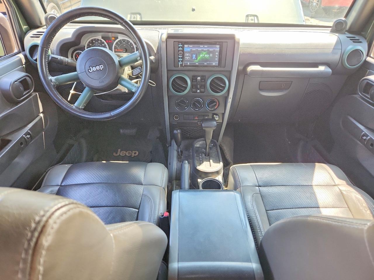 2009 Jeep Wrangler Unlimited Sahara Green vin: 1J4GA59199L733965