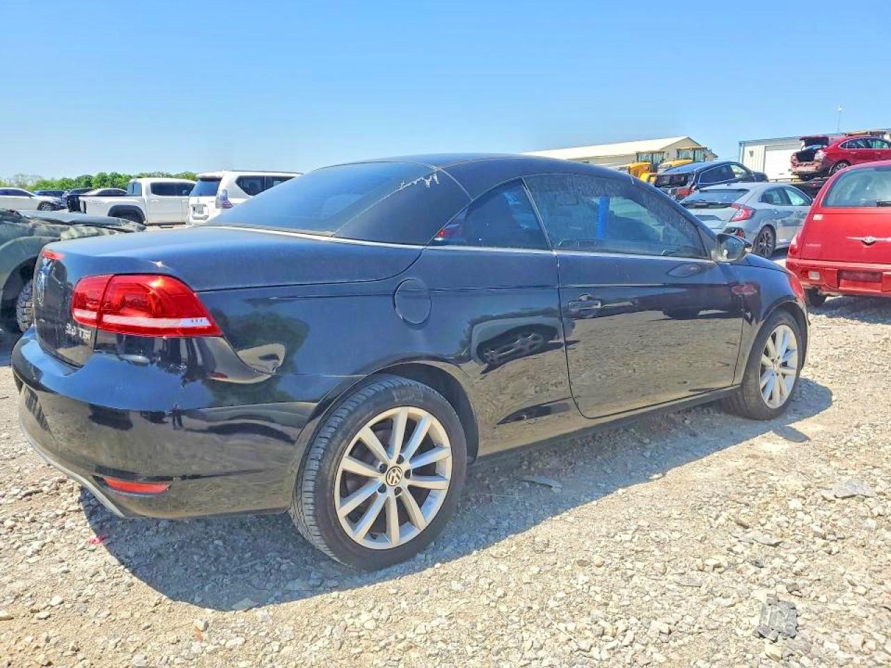2012 Volkswagen Eos Komfort Black vin: WVWBW7AH8CV005362