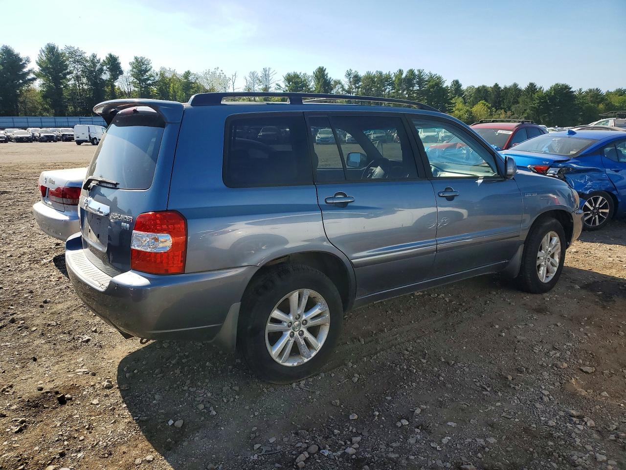 2006 Toyota Highlander Hybrid Blue vin: JTEEW21A460011336