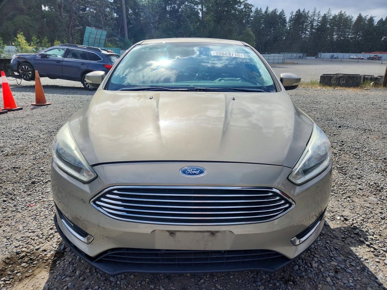 2015 Ford Focus Titanium Tan vin: 1FADP3J29FL363523